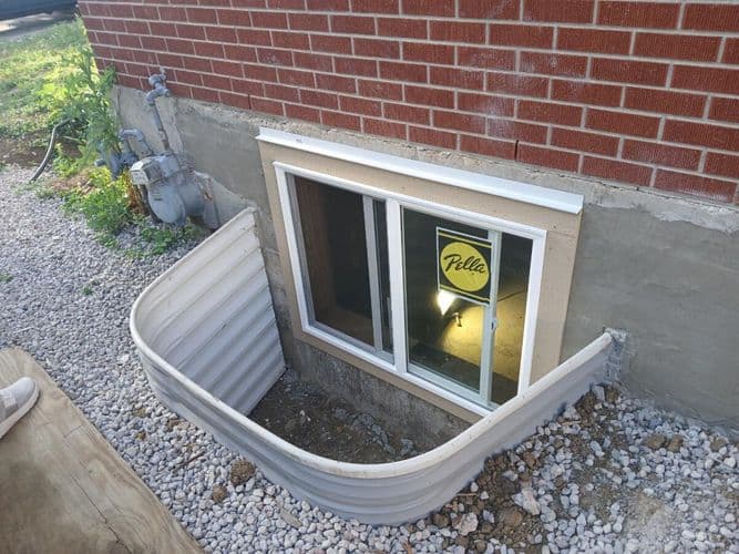 Newly installed egress window and window well